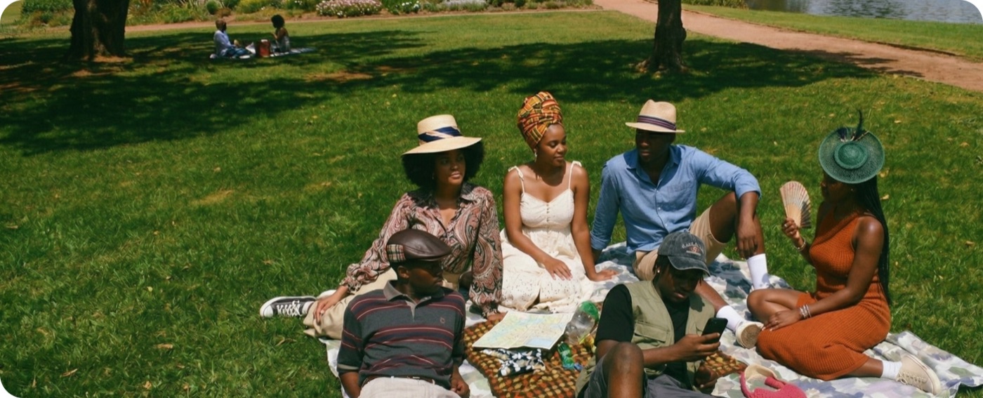 Friends gathered at a park picnic